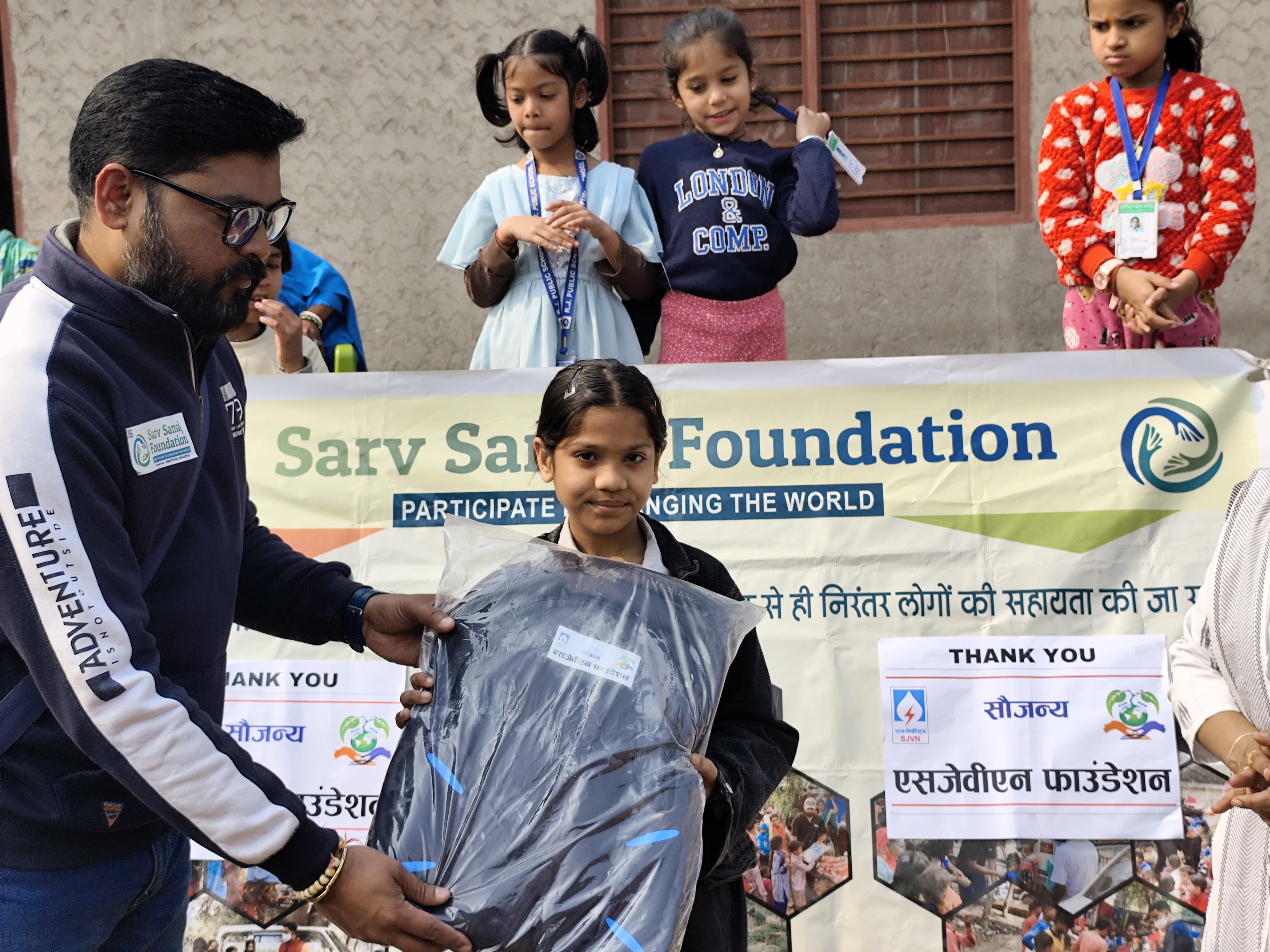 Sports activities and school bag distribution
